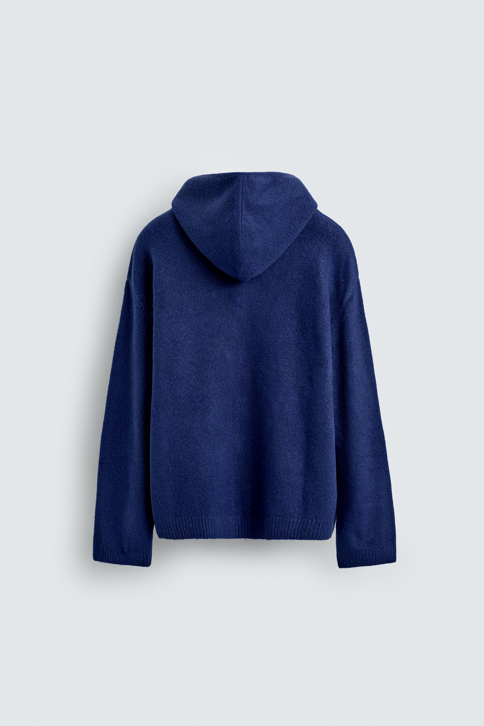 GILET EN MAILLE À CAPUCHE